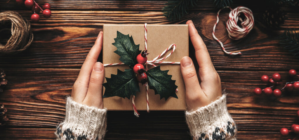 Woman holding holiday gift