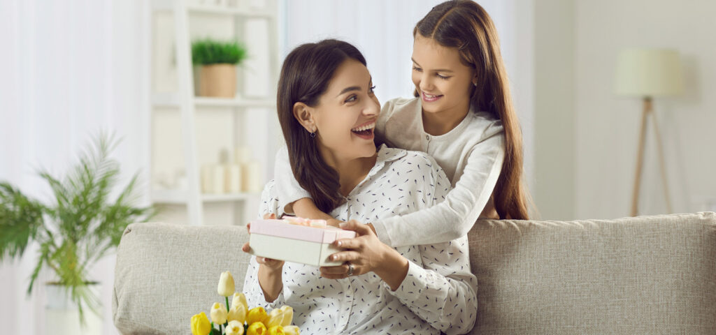 Daughter giving her mother a unique gift for Mother's Day